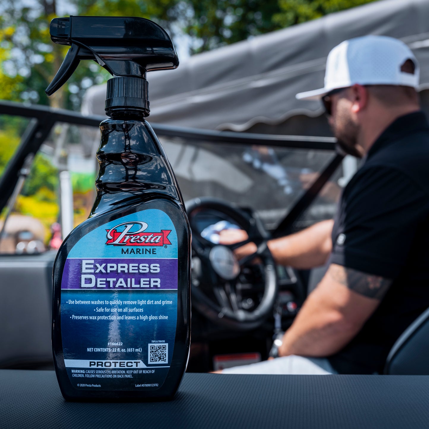 Presta Marine Express Detailer on a boat, with a male in the background