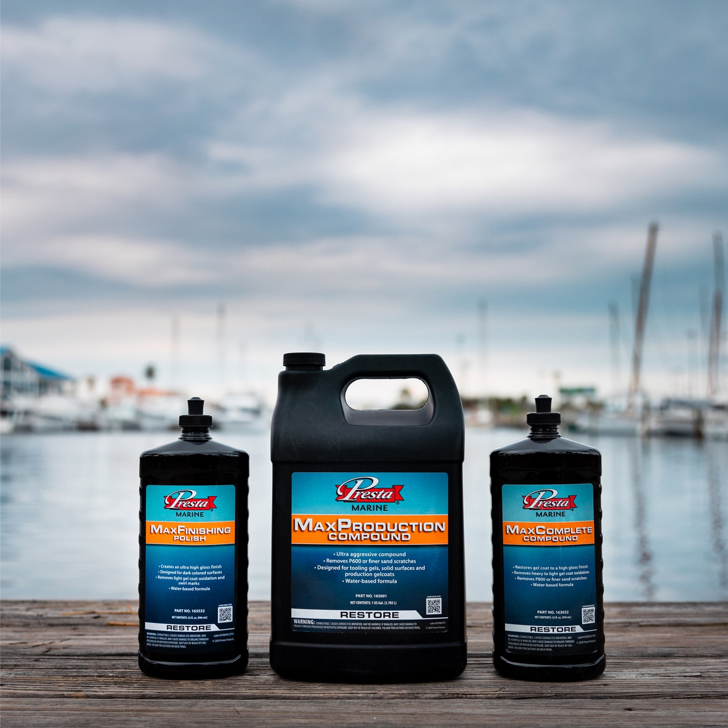 A group of Presta Marine bottles on a wood surface